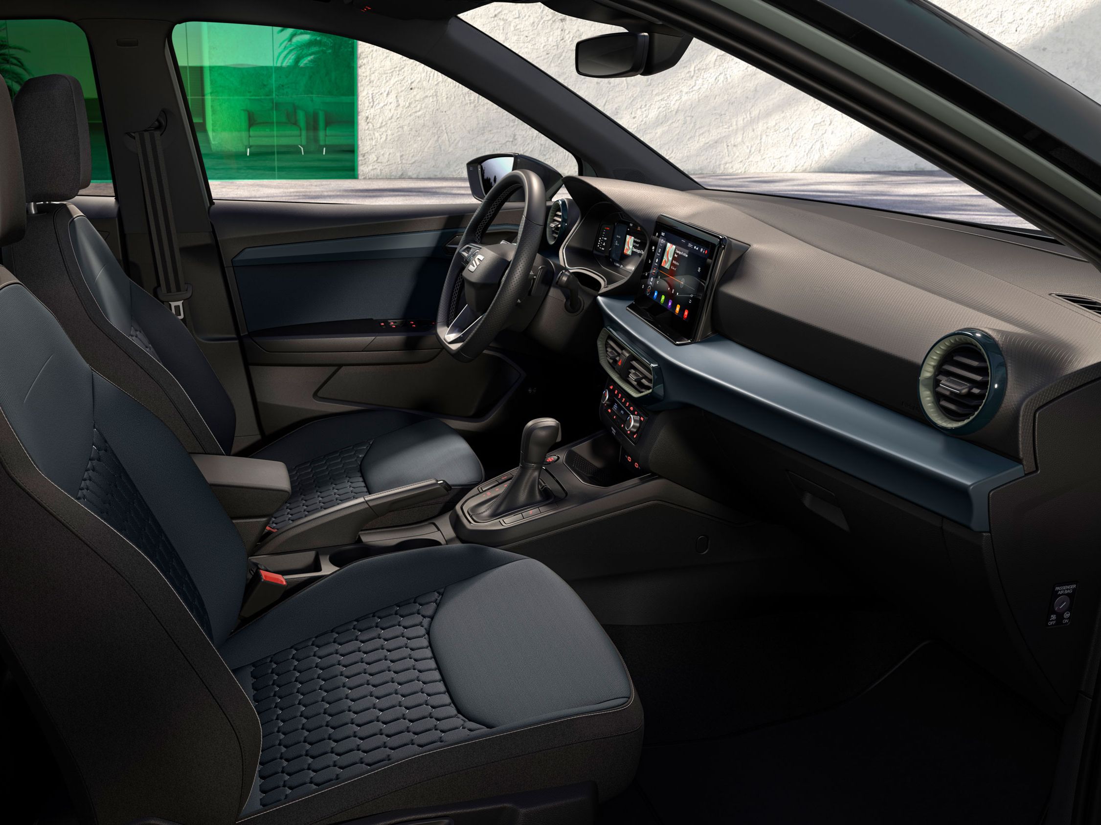 Detaily interiéru modelu SEAT Arona vrátane reliéfnych sedadiel vo farbe Aurora.