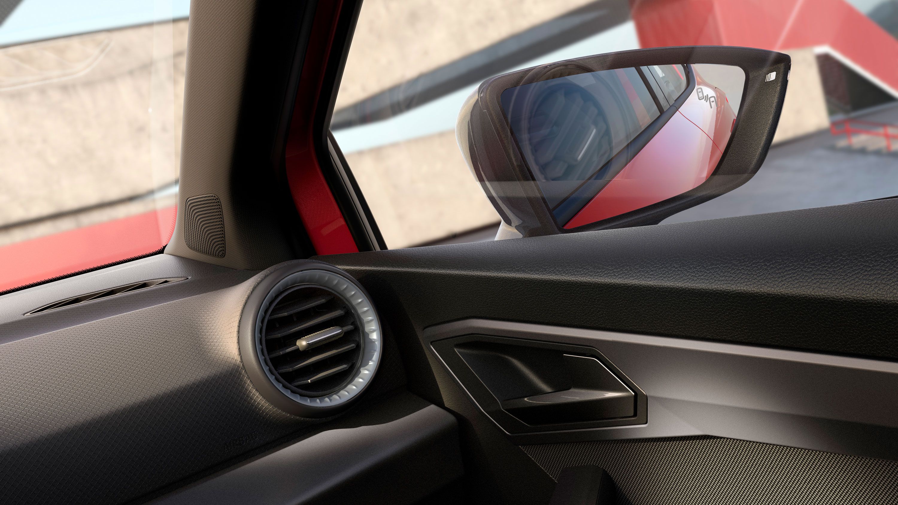 Čiastočný pohľad na interiér s niekoľkými detailmi a pravým vonkajším spätným zrkadlom.